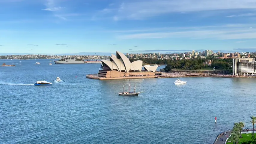 Aerial view of Sydney Harbour with the Opera House and boats on the water